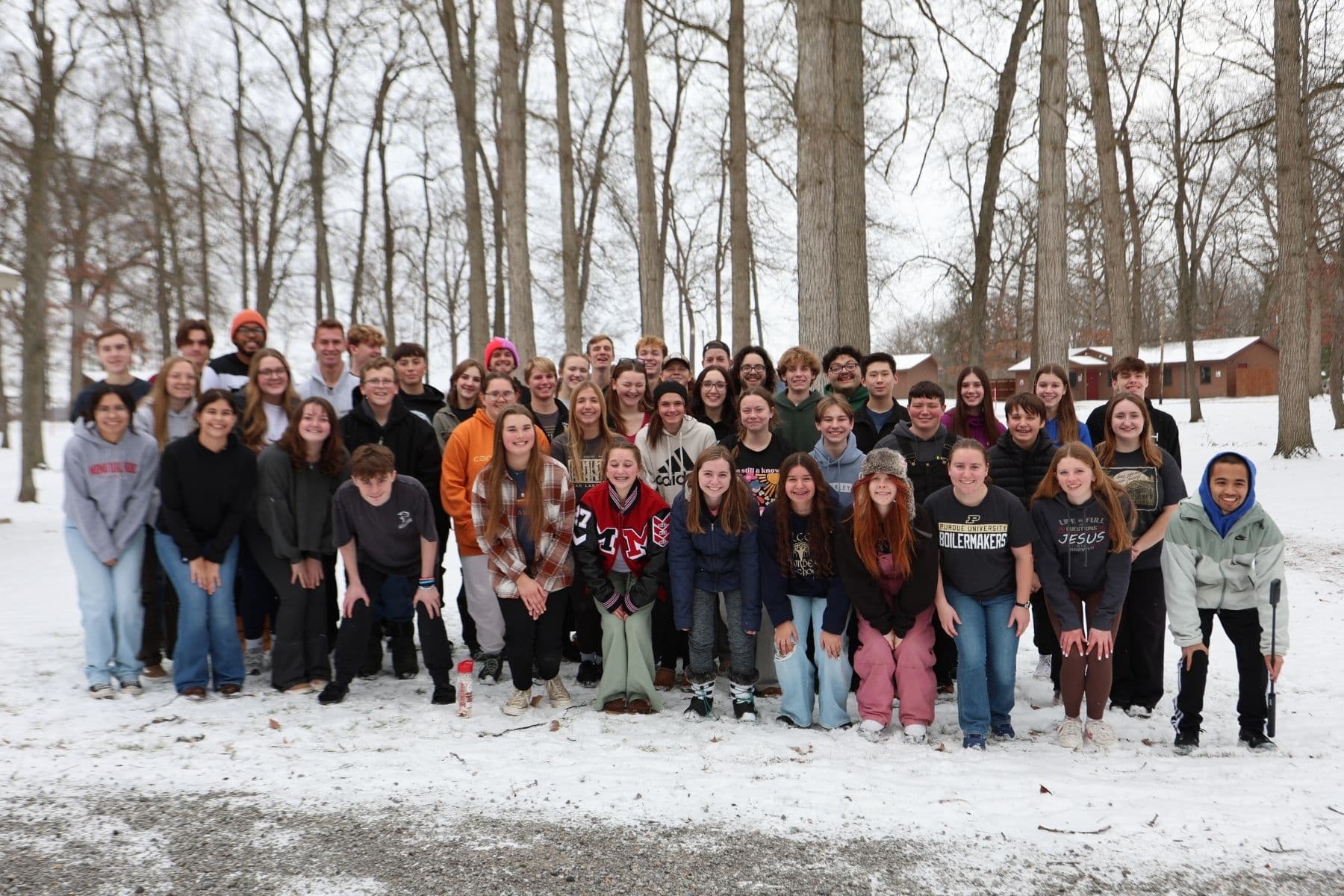 Girls sledding during winter retreat at Bear Lake Camp